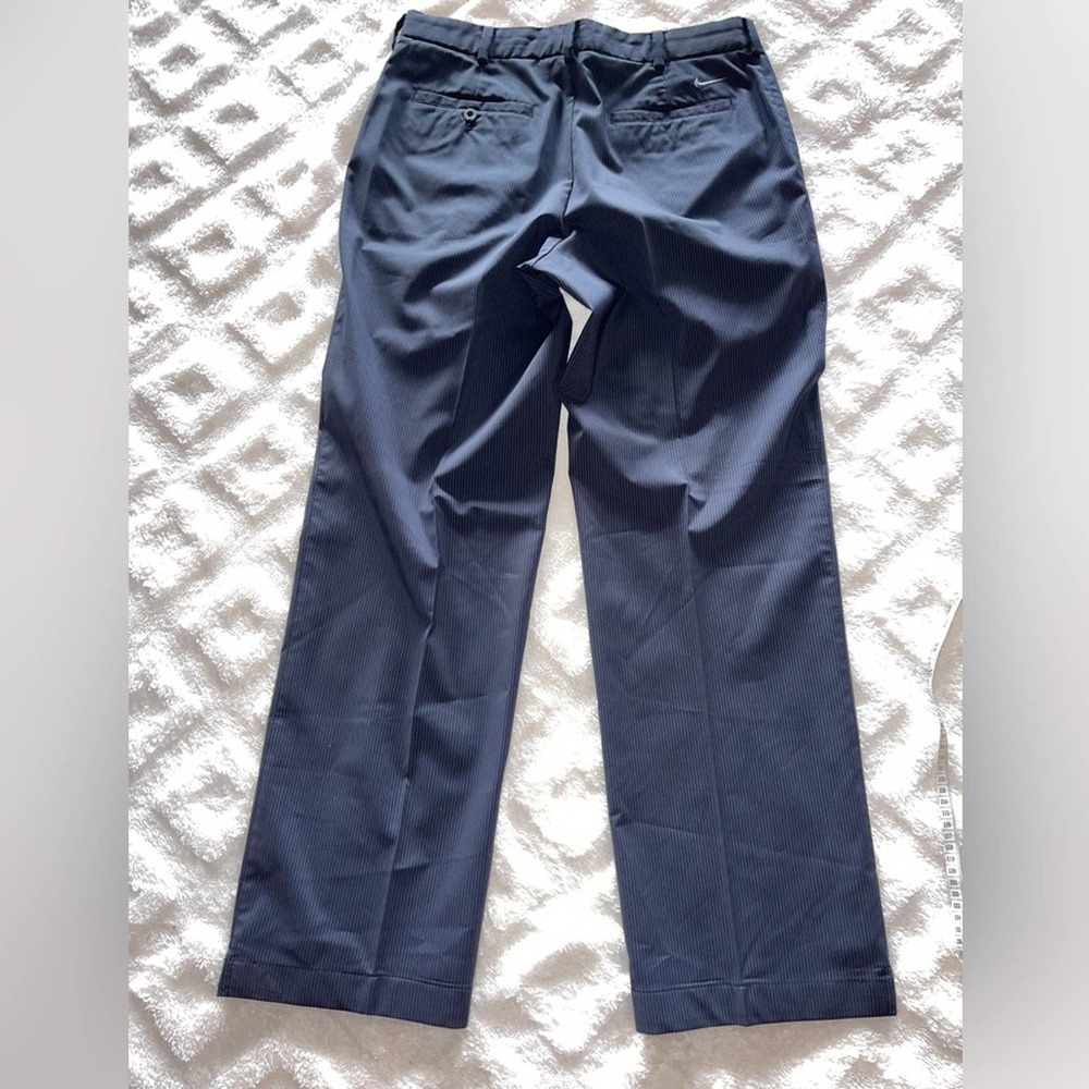 Nike black pinstripe flat front golf  pants size 32x31 1/2